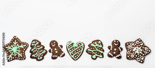 Gingerbread cookies on white background. Snowflake  star  man  heart shapes.
