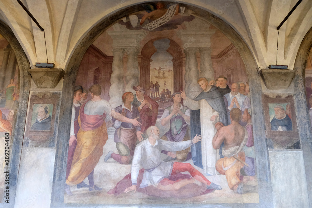 San Dominic resurrects a bricklayer, fresco by Benedetto Veli in the cloister of Santa Maria Novella Principal Dominican church in Florence, Italy