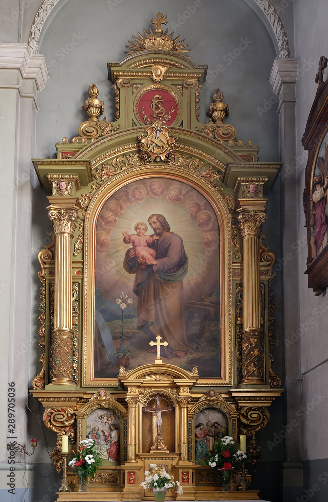 Saint Joseph holding child Jesus, altar in the Basilica of the Sacred Heart of Jesus in Zagreb, Croatia 
