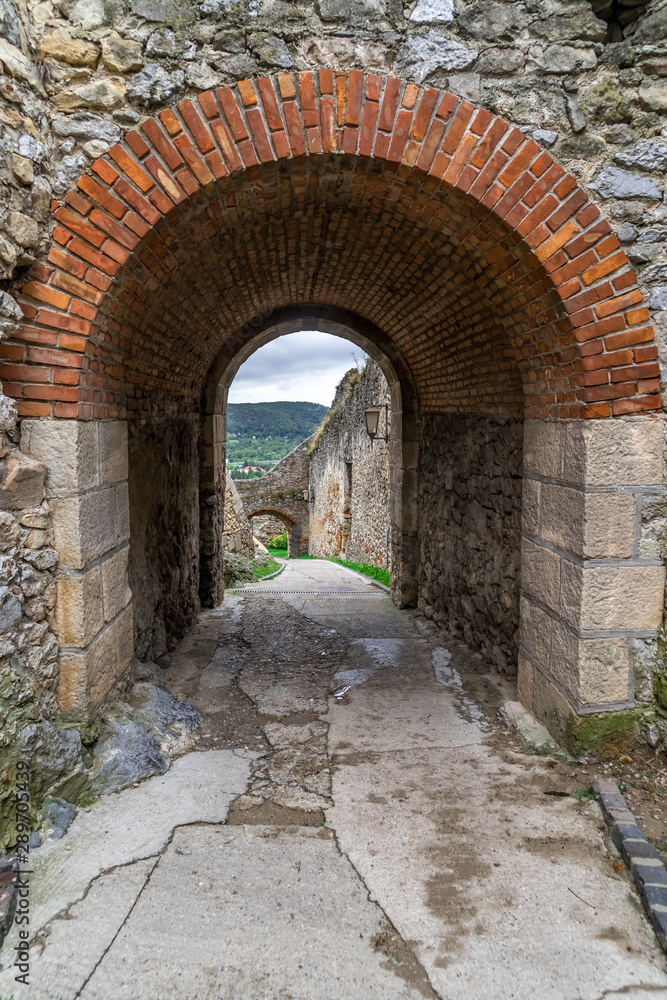 Medieval gate with brick arch in Trencin castle in Slovakia