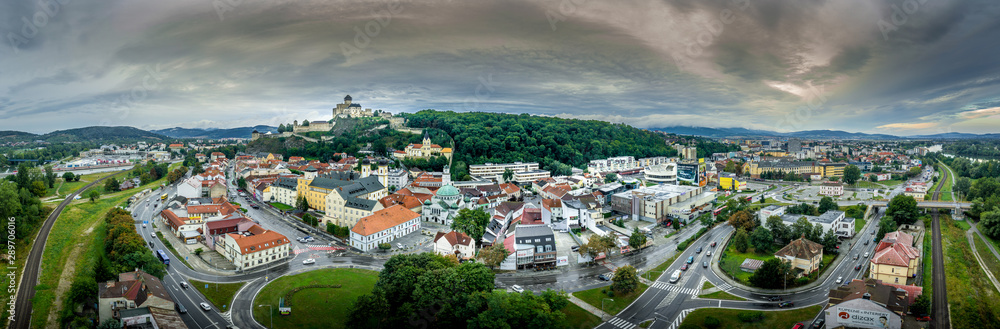 Aerial panorama of the Trencin Slovakia with the Vah river, bridges, castle, and medieval downtown