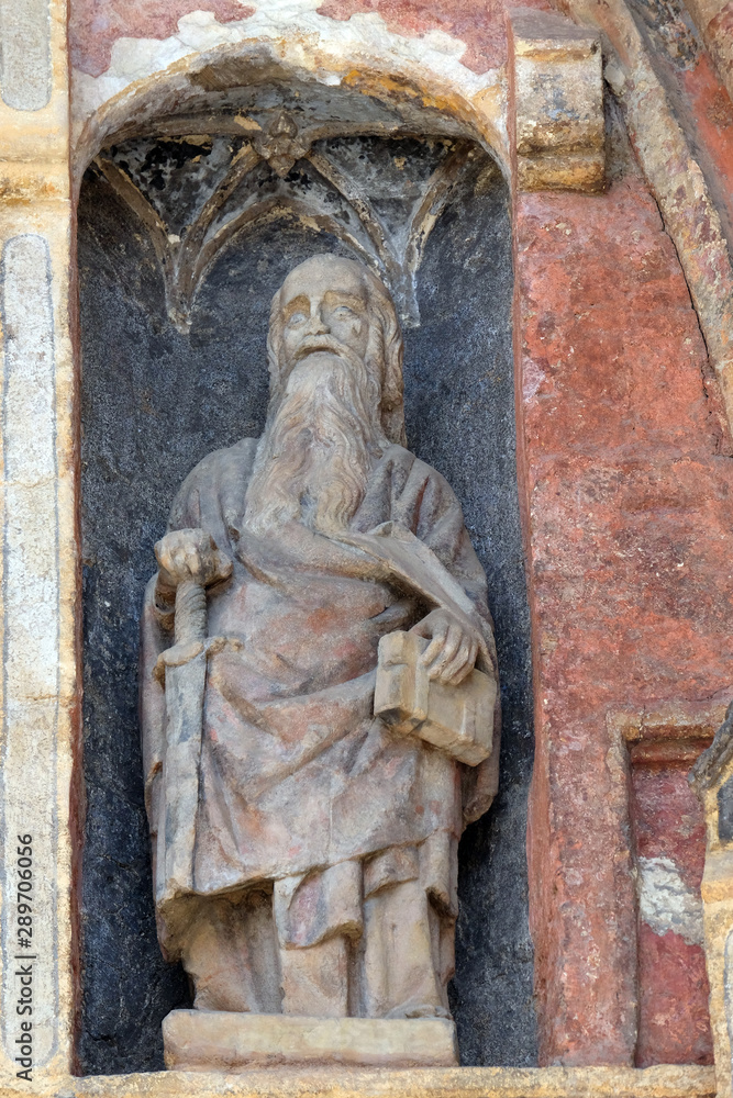 Statue of saint on the south portal of the church of St. Mark in Zagreb, Croatia