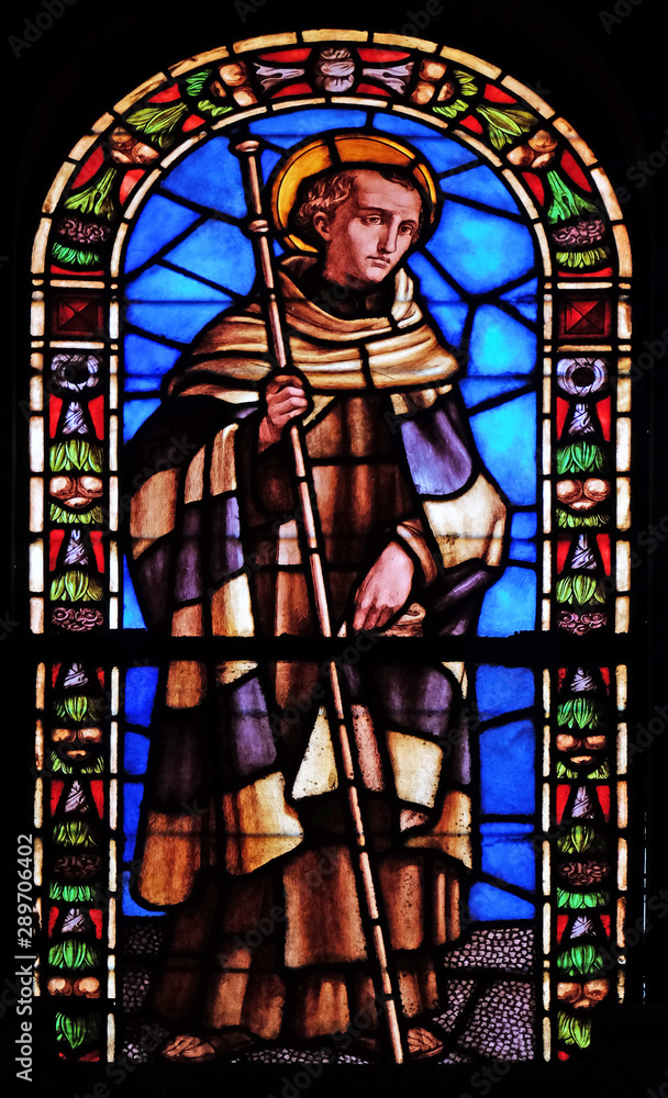 Stained glass window in the Santi Paolino e Donato church in Lucca, Tuscany, Italy 