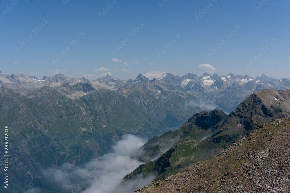 Panorama of the Caucasian ridge and Elbrus viewed from a peak near dombay, 2019, raw original