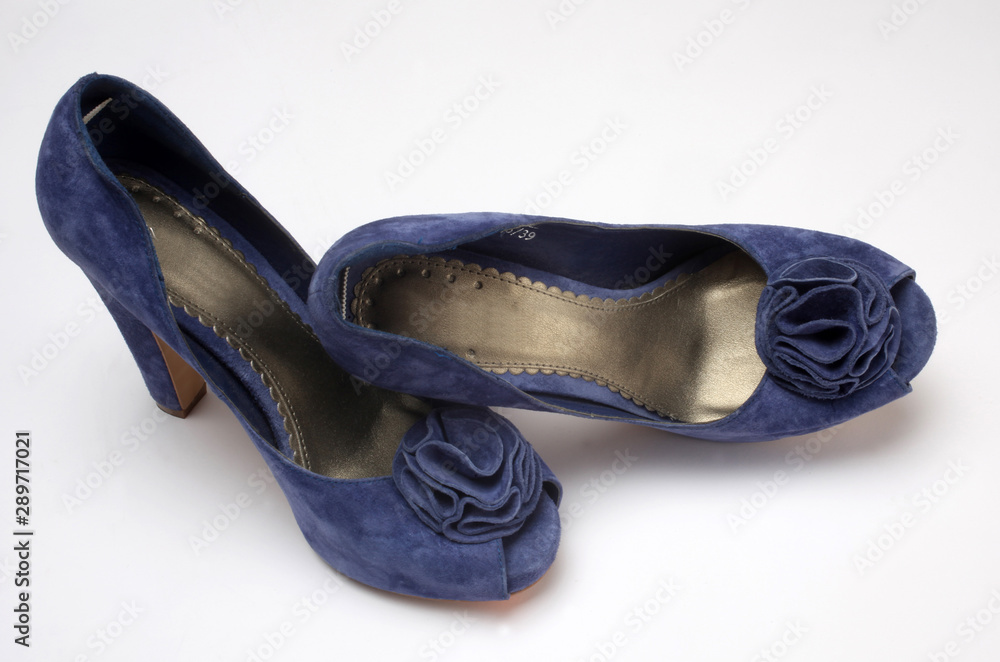 Fototapeta premium Blue high heeled shoe