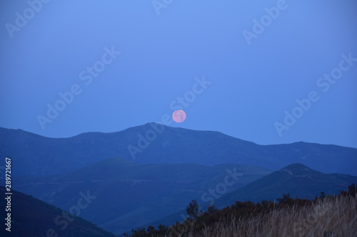 landscape with mountains and moon