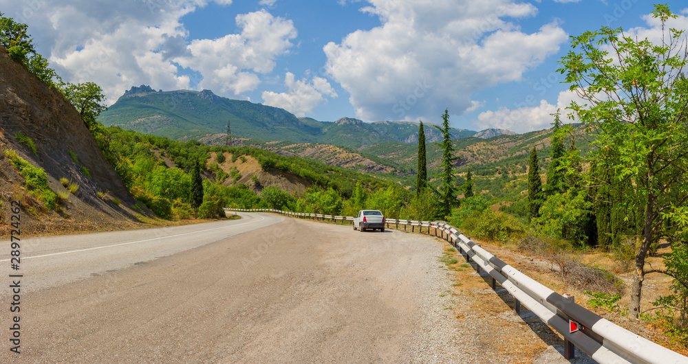 panorama of the twisting road in mountains on the coast