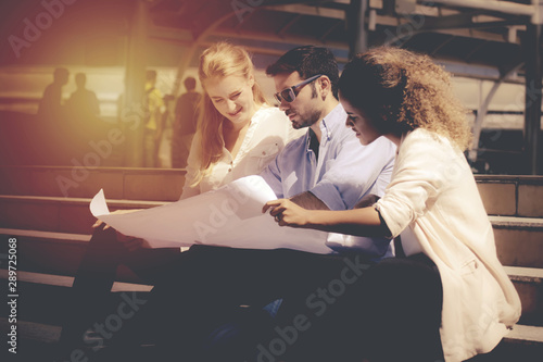 Group of civil engineer working with documents at construction site.engineers working at building site. 