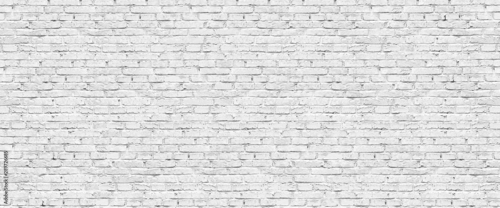 Fototapeta premium Panoramiczne tło z szerokiej starej białej cegły ściany tekstury. Tło projektu domu lub biura