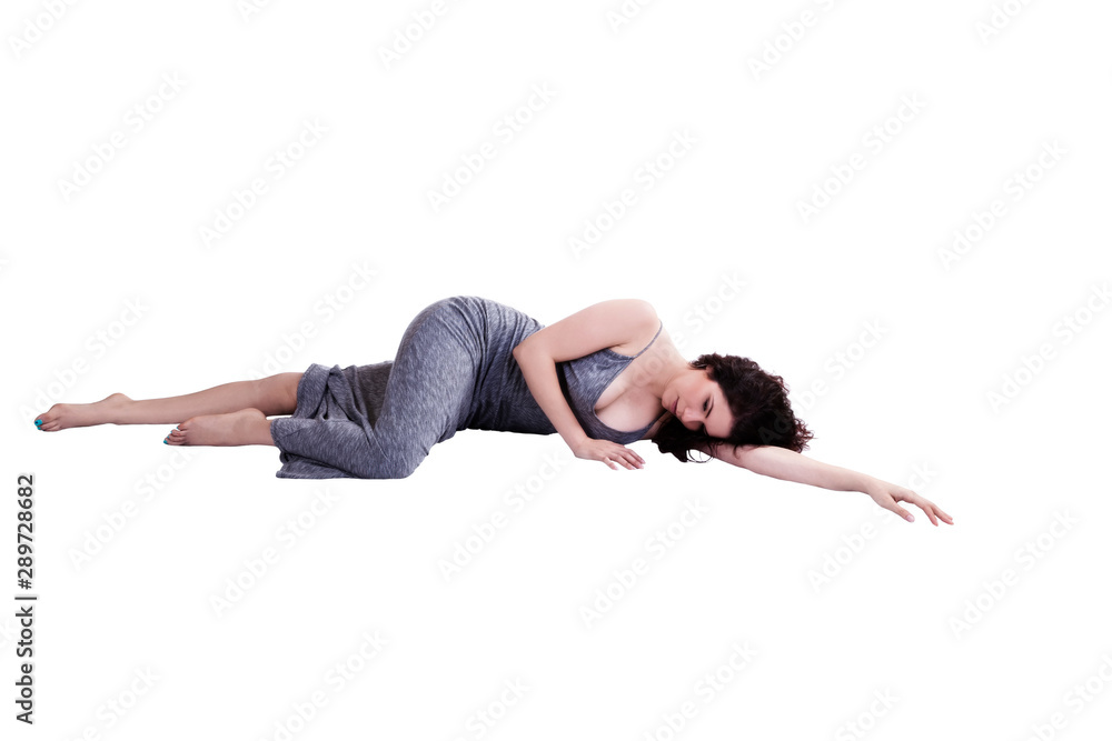Caucasian Woman In Gray Dress Reclining On White Background Caucasian Woman In Gray Dress Reclining On White Background
