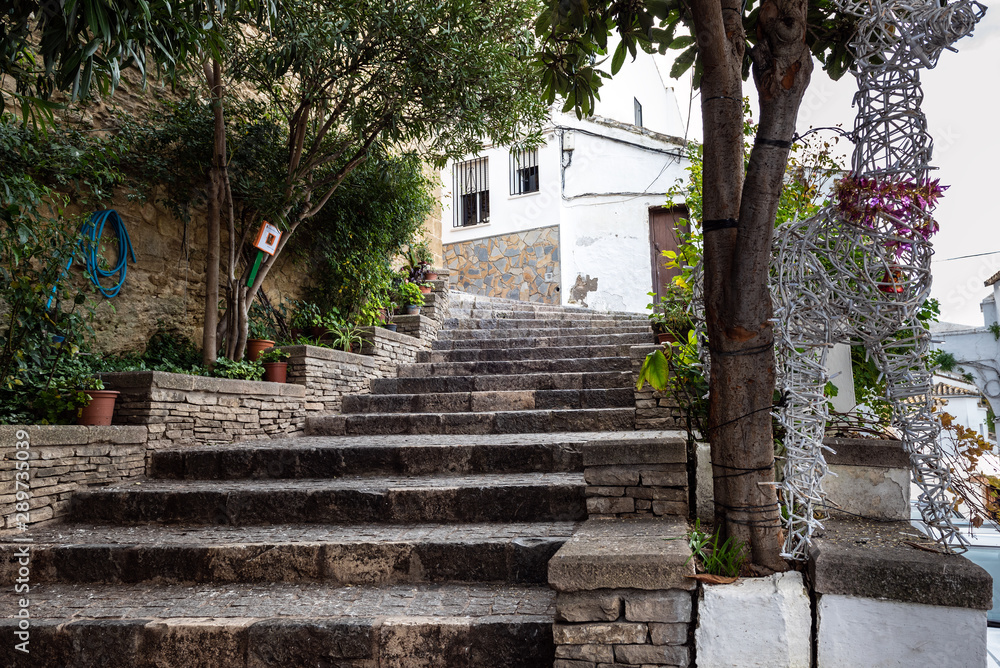 Old stone steps in Estepona town, Andalusia, Spain