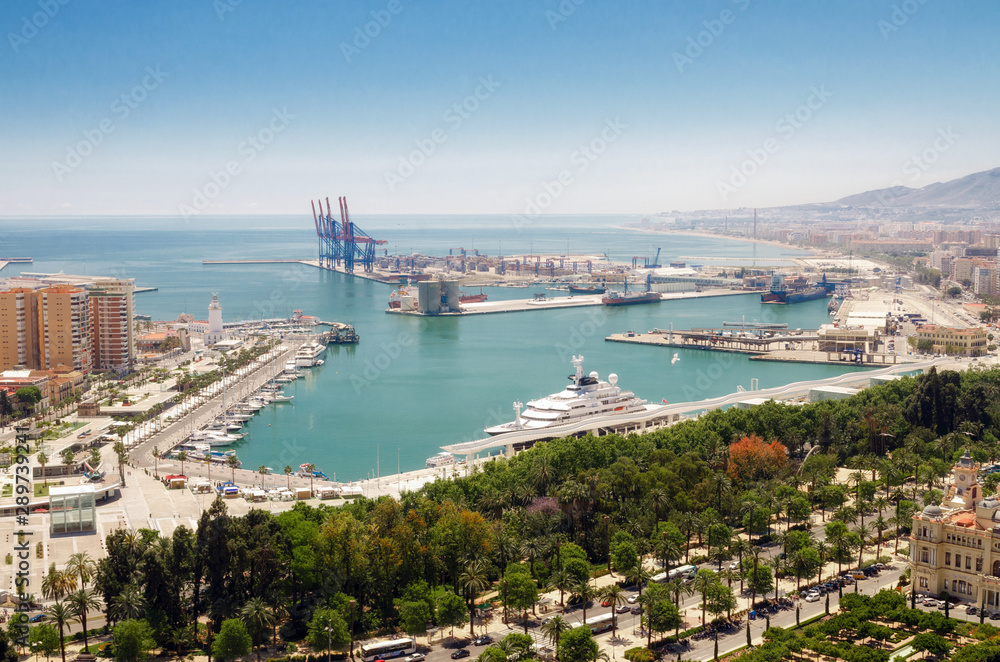 Cityscape of Malaga with mediterranean sea port harbor. Andalusia, Spain .