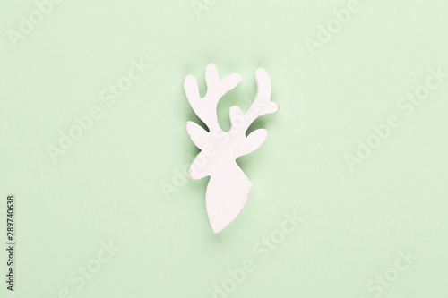 Christmas decor. Christmas decorations on pastel background. Flat lay, top view, copy space.
