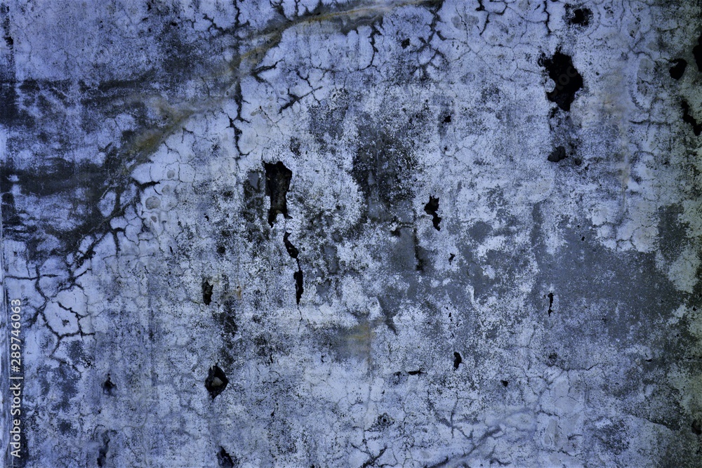 The background of the crack wall is blue .Texture. The background of the crack wall is blue .Texture.