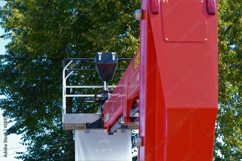 red crane-lift with hydraulic drive