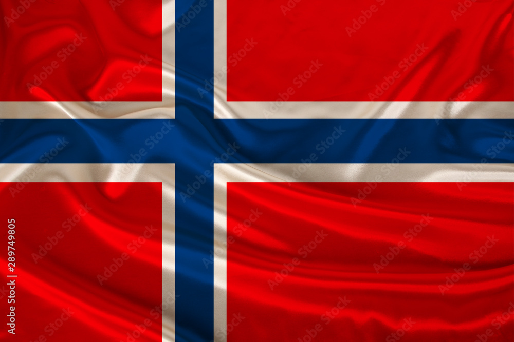 Fototapeta premium photo of the national flag of Norway on a luxurious texture of satin, silk with waves, folds and highlights, close-up, copy space, travel concept, economy and state policy, illustration