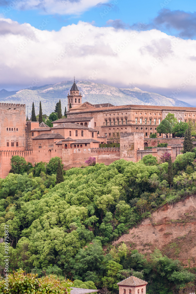 flavour of andalusia, view of the alhambra from the saint nicolas sightseein during a cloudy day granada, spain