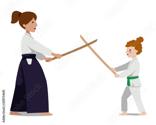 A woman in hakama and a girl in keykogi practice with bokken.