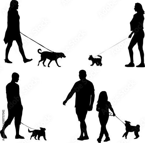 people walking with his dog silhouettes