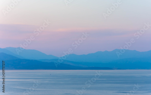 evening landscape with mountains and sea