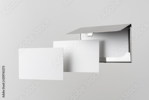 top view of business card with case on white © voyata
