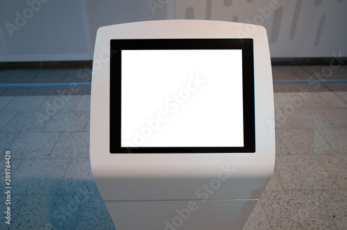 Mock up template/background texture of a blank white touch screen kiosk machine. photo