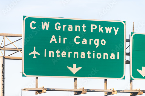 Air cargo freight commercial international airport direction road green sign to West Grant parkway exit in Atalnta, Georgia city photo