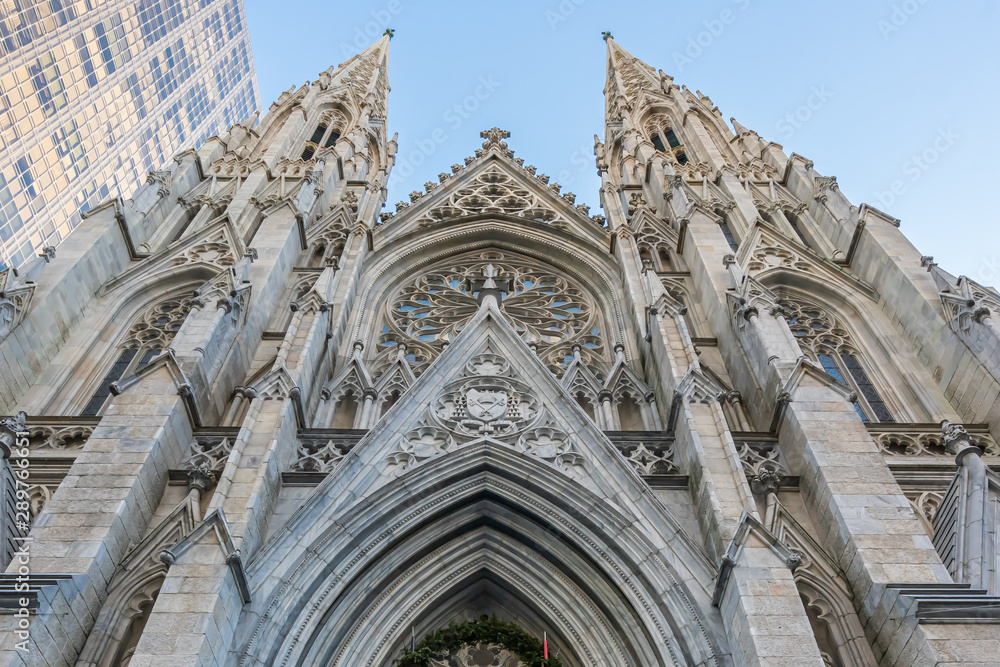 New York City, NY, USA - December, 2018 - The Cathedral of St. Patrick is a decorated Neo-Gothic-style Roman Catholic cathedral church in the United States, located at Fifth Avenue.