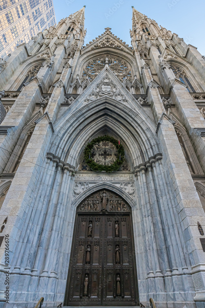 New York City, NY, USA - December, 2018 - The Cathedral of St. Patrick is a decorated Neo-Gothic-style Roman Catholic cathedral church in the United States, located at Fifth Avenue.