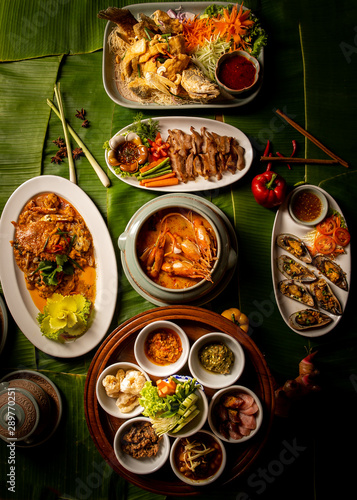 Food and ingredients on the banana leaves.