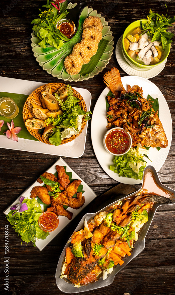 Thai food put on the woodenboard. Thai food put on the woodenboard.
