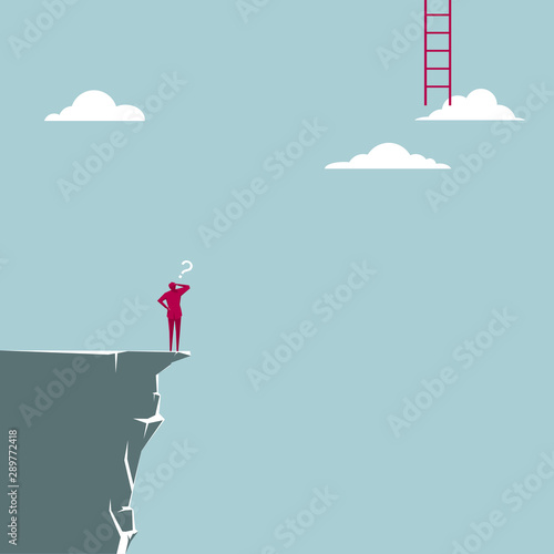 Businessman standing on the edge of the cliff. The background is blue.