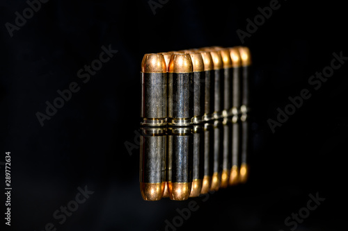 40 Caliber hollow point ammunition on black background