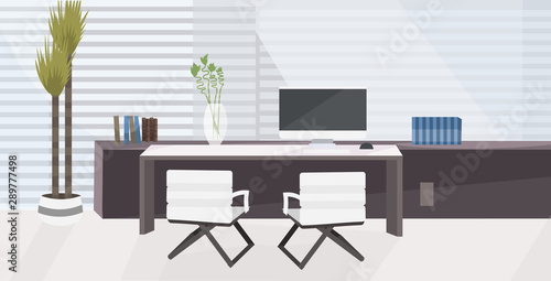 stylish workplace with computer monitor at office modern cabinet interior empty no people room with furniture flat horizontal