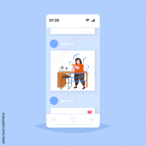 fat overweight woman eating hamburger obesity unhealthy nutrition fast food concept obese girl having lunch smartphone screen online mobile app full length flat