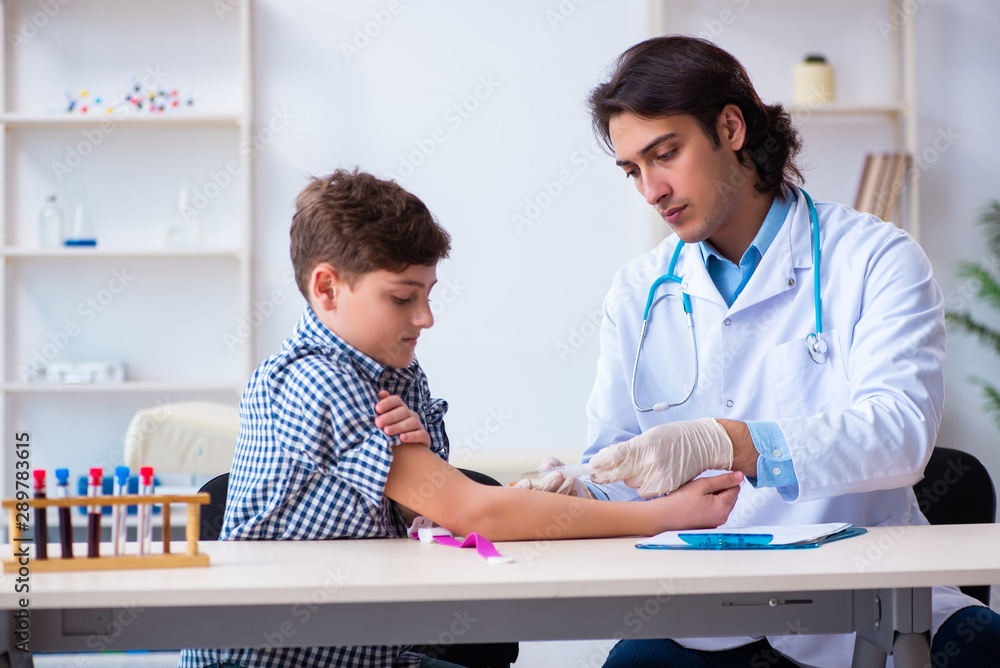 Fototapeta premium Boy in blood tranfusion concept