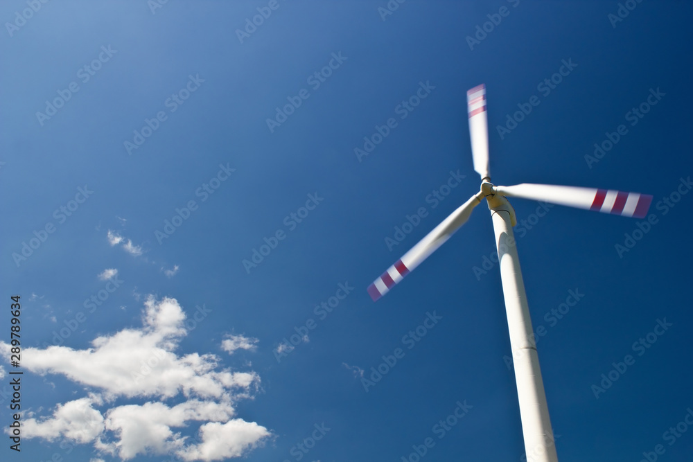 wind turbine against blue sky