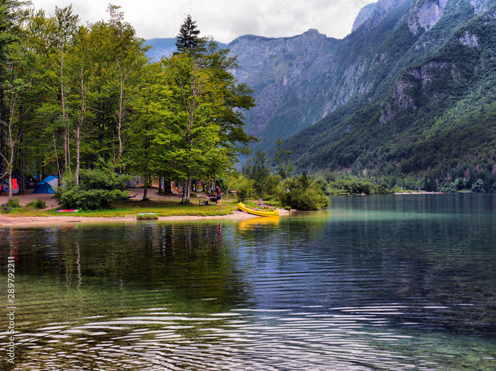 Panoramic view of Lake Bohinj, the largest permanent lake in Slovenia. It is located within the Bohinj Valley of the Julian Alps,