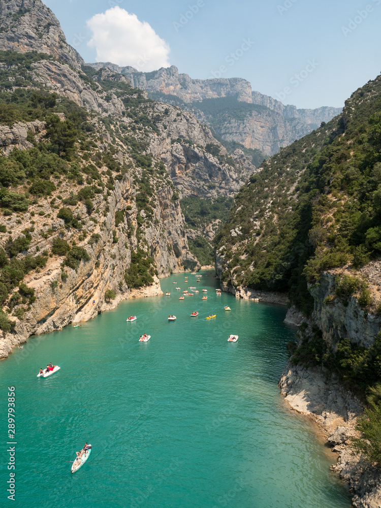 France, july 2019: St Croix Lake, Les Gorges du Verdon with Tourists in kayaks, boats and paddle boats., Provence