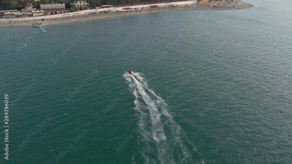 Flight over a pleasure boat at sea. Aerial shot Flight over a pleasure boat at sea. Aerial shot
