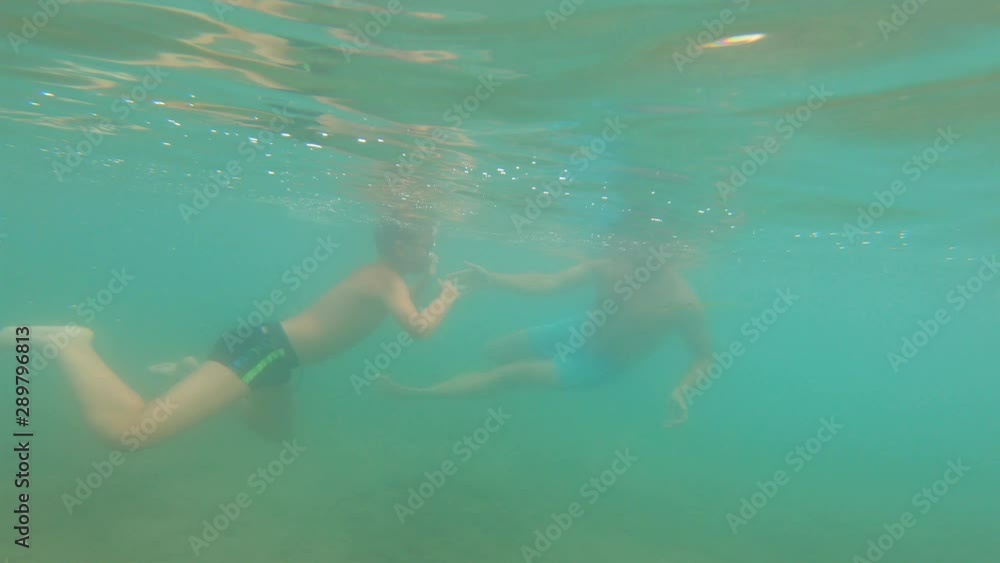 First strokes when boy with special needs starts to dive, under watchful eye of his father First strokes when boy with special needs starts to dive, under watchful eye of his father