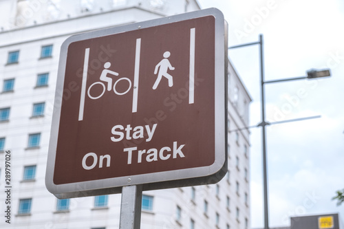 Road sign stay on track isolated