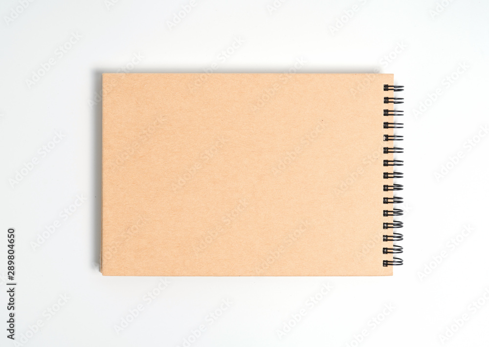 A notebook on a spring. Isolated on white background. A notebook on a spring. Isolated on white background.