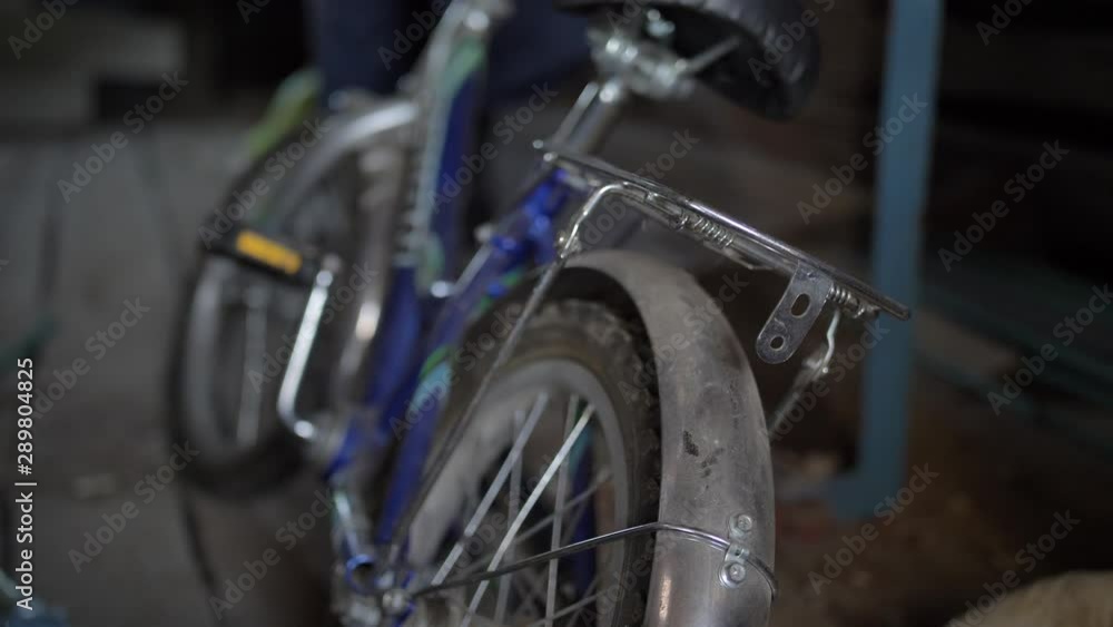 boy found an old bike in the basement boy found an old bike in the basement