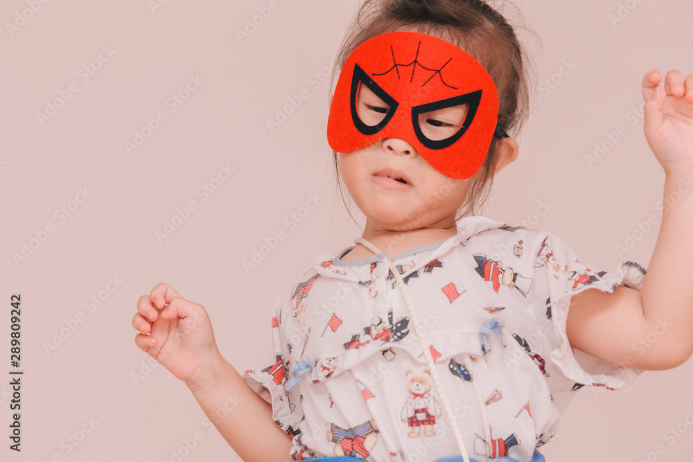 Children girl with the mask in halloween day Children girl with the mask in halloween day