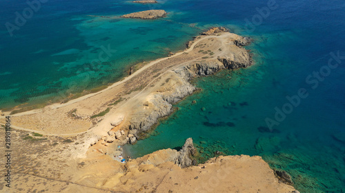 Aerial drone photo of emerald secluded crystal clear sea rocky cove of Ble limanaki or Blue Harbour in famous island of Astypalaia, Dodecanese, Greece