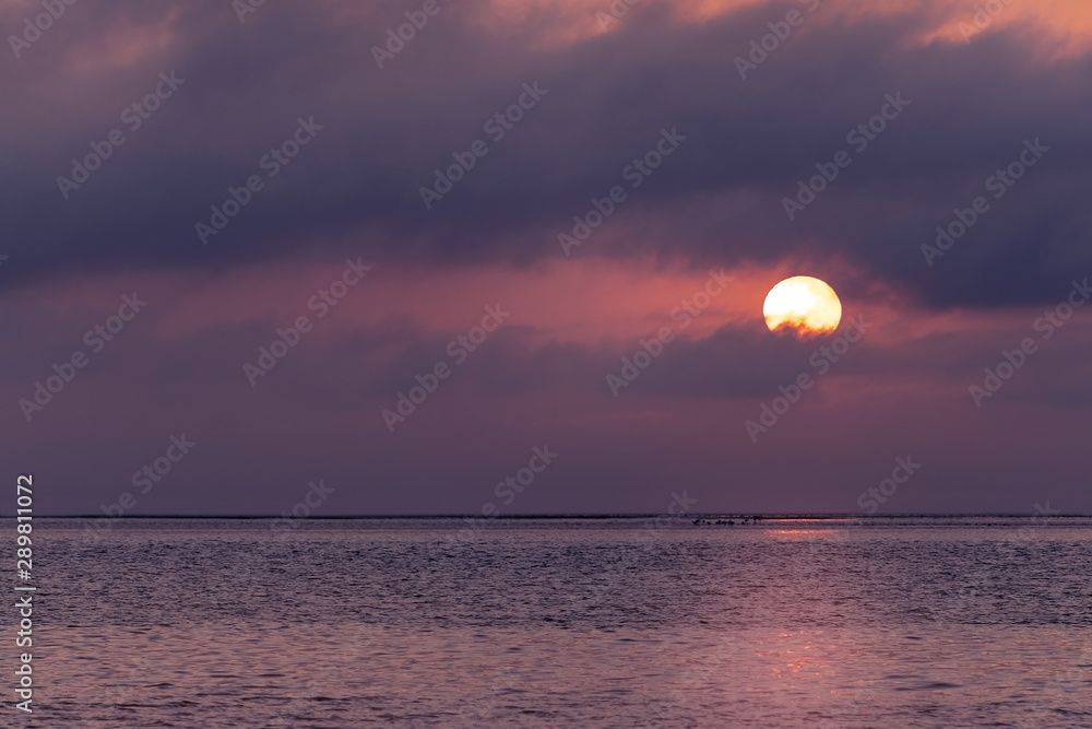 Sunrise over the sea and beautiful cloudscape. Meditation ocean and sky background. 