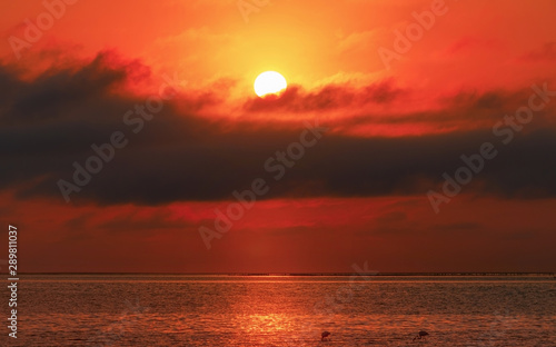 Sunrise over the sea and beautiful cloudscape. Meditation ocean and sky background. 