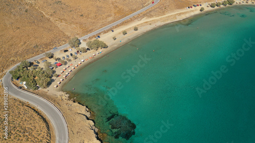 Aerial drone photo of famous calm turquoise sea sandy beaches of Steno next to small chapel of Agios Mamas  Astypalaia island  Dodecanese  Greece