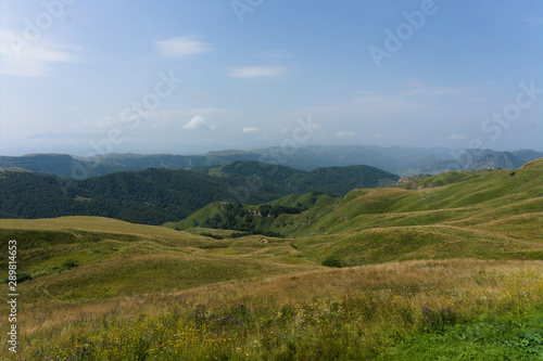 Lush green lawns meadows and mountains above 2000 m on the gumbashi pass in the northern caucasus between dombay and kislowodsk, raw original picture